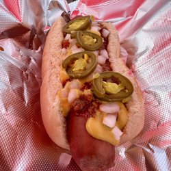 Grateful Redz Hot Dogz - Hot dog with chili sauce, peppers, onions and mustard