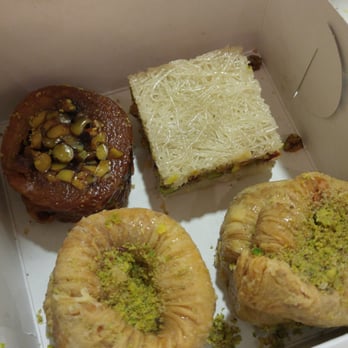 Adonis - The ones on the bottom with the crumbled up pistachios are the best! We tried the others out of curiosity, but not that great. - Grocery Near Me - Toronto, Ontario Adonis - The ones on the bottom with the crumbled up pistachios are the best! We tried the others out of curiosity, but not that great. - Grocery Near Me - Toronto, Ontario
