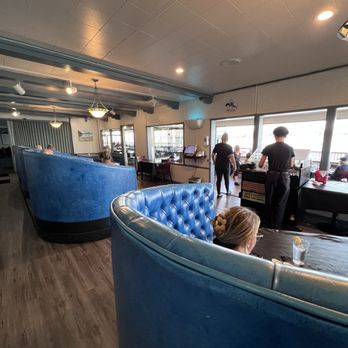 The Point Restaurant - Interior space which also leads into some outdoor seating, overlooking the delta. - Seafood Near Me - Rio Vista, California The Point Restaurant - Interior space which also leads into some outdoor seating, overlooking the delta. - Seafood Near Me - Rio Vista, California