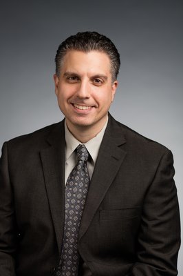 W. Michael Kutayli, MD