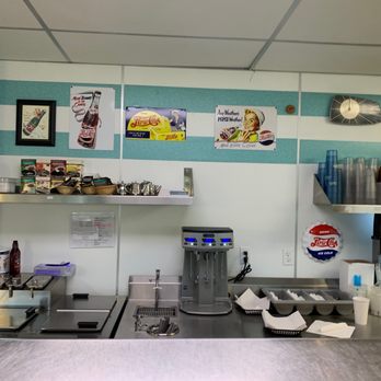 Penny's Diner - a kitchen with a counter and shelves - Diners Near Me - Dunsmuir, California Penny's Diner - a kitchen with a counter and shelves - Diners Near Me - Dunsmuir, California