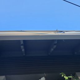 Big gouge in the gutter ripping off the house.