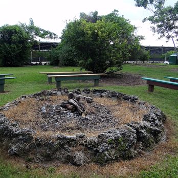 Castellow Hammock - A bonfire near the park entrance.  This would make for a great place for some ghost stories, roasting marshmallows, and playing some songs. - Parks Near Me - Miami, Florida