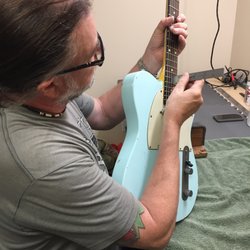 Music Service Center - Greg setting up this Nash Telecaster