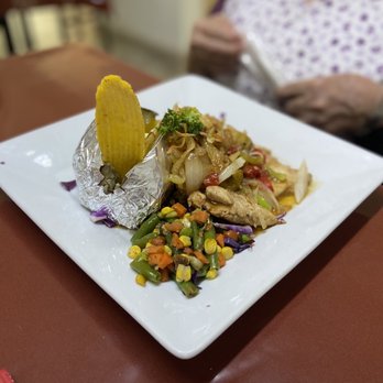 Pasatiempos Restaurant - Grilled chicken with baked potatoe and veggies. - Puerto Rican Near Me - Moca, Puerto Rico