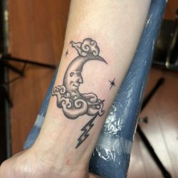 Rock of Ages Tattoos & Body Piercing - My arm