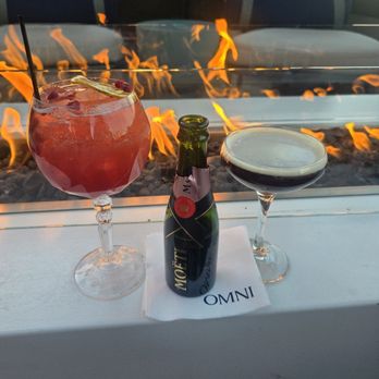Lucero Rooftop Restaurant + Bar - Pomegranate glow and el Lucero martini - Bars Near Me - Tempe, Arizona