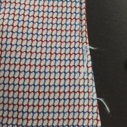 Quality of another shirt. Loose threads on collar, buttons, and sleeves.