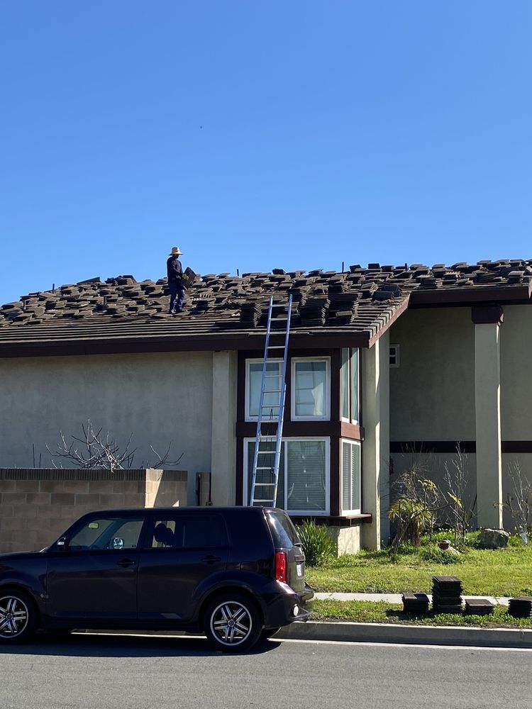Slide of Yoshida Roofing Company
