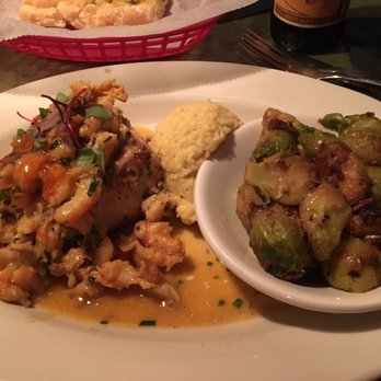Bon Temps Grill - The night's special. Grilled mahi with crawfish etouffé on top, grits & Brussels sprouts - Cajun/Creole Near Me - Lafayette, Louisiana Bon Temps Grill - The night's special. Grilled mahi with crawfish etouffé on top, grits & Brussels sprouts - Cajun/Creole Near Me - Lafayette, Louisiana