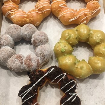 Friendly Donuts - Guava, ube matcha and I think cookie/Oreo flavored mochi donuts. Forgot to take a picture before the kids got to the box! - Donuts Near Me - Orange, California