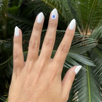 Lilly's Nails & Spa - White gel with evil eye design - Nail Salons Near Me - New Orleans, Louisiana Lilly's Nails & Spa - White gel with evil eye design - Nail Salons Near Me - New Orleans, Louisiana