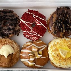 The Donut Guy - German Chocolate, Red Velvet, Chocolate Truffle, Biscoff Cheescake, Apple Cinnamon & Lemon Blueberry