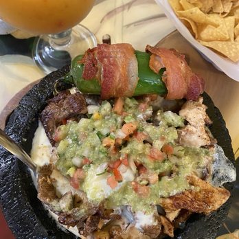 Pueblito Mexican Grill - Molcajete dish. Top dollar but way under $30. You can't even see the pork chop. - Mexican Near Me - Durham, California Pueblito Mexican Grill - Molcajete dish. Top dollar but way under $30. You can't even see the pork chop. - Mexican Near Me - Durham, California