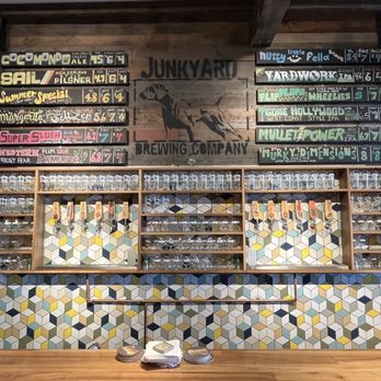 Junkyard Brewing Company - a wall of beer bottles - Breweries Near Me - Moorhead, Minnesota Junkyard Brewing Company - a wall of beer bottles - Breweries Near Me - Moorhead, Minnesota