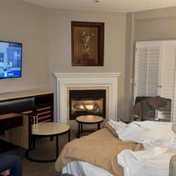 Hyatt Vacation Club At The Welk - Living room area with the sofa bed out and fireplace