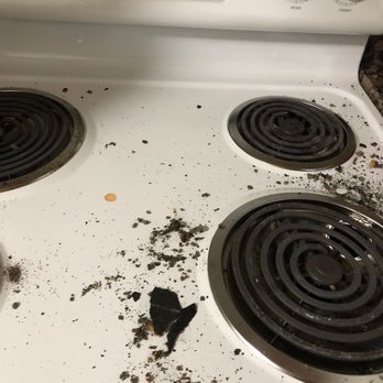 All Weather Roofing - a stove with dirt all over it - General Contractors Near Me - Oakland, California