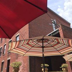 Mendon Street Kitchen - The patio area is tucked away behind Main St.