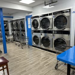 West End Laundromat - High quality dryers, costs $0.25 per 4 minutes. Lint compartments are cleaned daily
