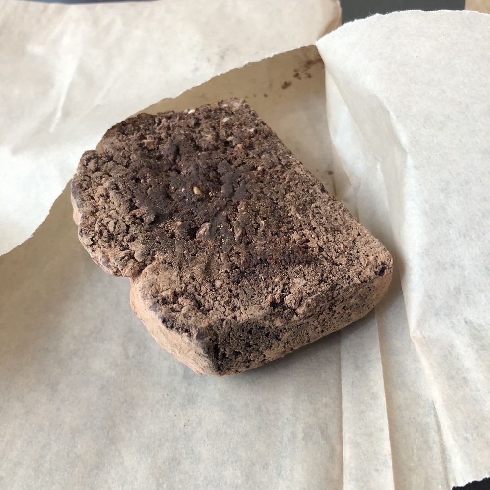 a piece of bread on a piece of paper a piece of bread on a piece of paper