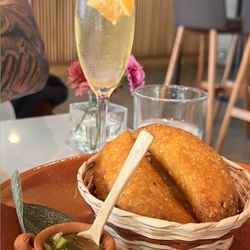 Pacifico - Empanadas. Delicious. We have the beef and the pepian... both great