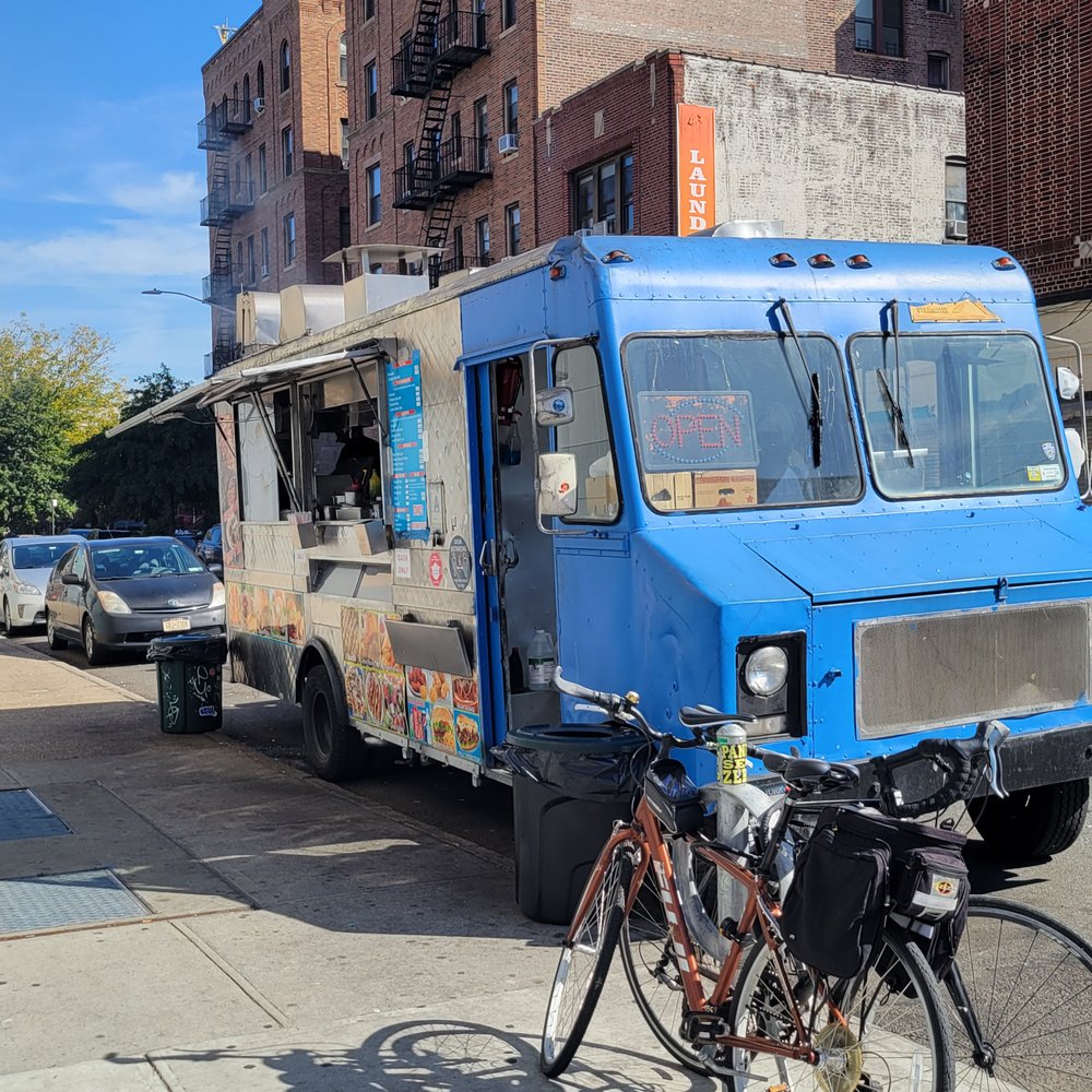 Broadway Shish Kabob Cart - a bicycle parked next to it - Food Stands Near Me - Queens, New York Broadway Shish Kabob Cart - a bicycle parked next to it - Food Stands Near Me - Queens, New York