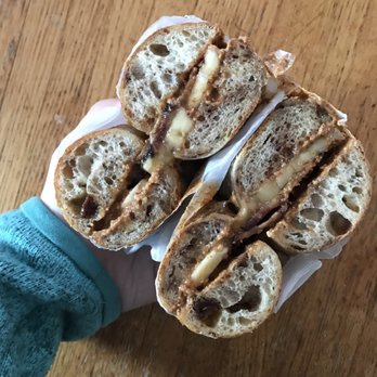 Bagelsaurus - T-Rex (homemade almond butter, bananas, bacon, and honey) on a cinnamon raisin bagel. - Bagels Near Me - Cambridge, Massachusetts Bagelsaurus - T-Rex (homemade almond butter, bananas, bacon, and honey) on a cinnamon raisin bagel. - Bagels Near Me - Cambridge, Massachusetts
