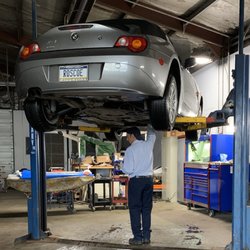 Felouzis Auto Repair - Mike checking my underneath of my car