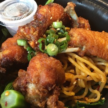 Mama Chow's Kitchen - Lollipop chicken wings over spicy garlic noodles. Delicious! - Food Trucks Near Me - Portland, Oregon