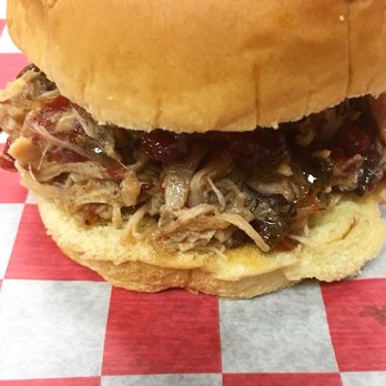Fergie's - a pulled pork sandwich on a bun - American Near Me - Findlay, Ohio