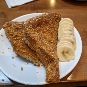 Canela Cafe - Half portion of cinnamon french toast (minus 1 bite) - SO good and not too sweet! - Breakfast & Brunch Near Me - Milwaukee, Wisconsin