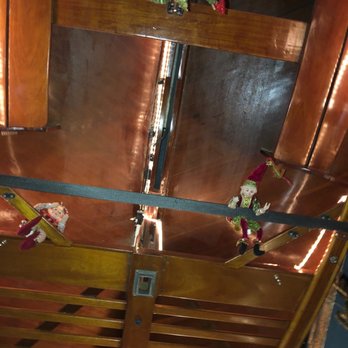 Touché - a close up of a wooden boat - Bars Near Me - Vermilion, Ohio