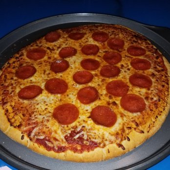 Draft Daze - a pepperoni pizza on a pan - Sports Bars Near Me - Fayetteville, North Carolina
