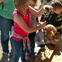 Bee Family Centennial Farm Museum - Drilling holes and grinding corn!