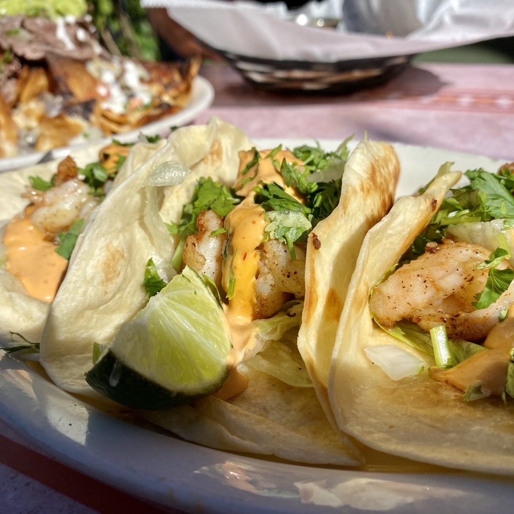 Shrimp (Camaron) Tacos & Nachos Libres with Asada - grilled steak Shrimp (Camaron) Tacos & Nachos Libres with Asada - grilled steak