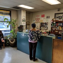 Harris Quon Auto Service - The waiting room. Not much, but works and they have a bathroom, drink machine and water fountain out of site.