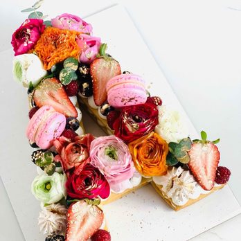 CocoaBerry Cake Co - Orange/yellow color floral option! - Bakeries Near Me