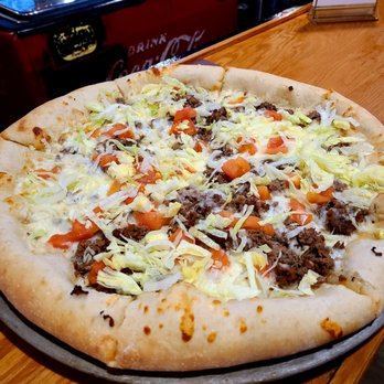 Beach Grill Plus - a pizza on a pizza pan - Bars Near Me - Earleville, Maryland Beach Grill Plus - a pizza on a pizza pan - Bars Near Me - Earleville, Maryland