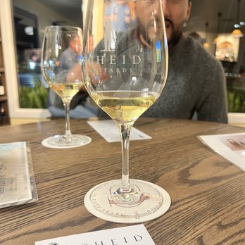 Scheid Vineyards Tasting Room - a glass of white wine - Wine Tasting Room Near Me - Carmel, California Scheid Vineyards Tasting Room - a glass of white wine - Wine Tasting Room Near Me - Carmel, California