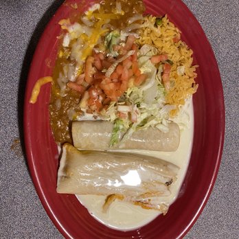 Iguana Azul - Tamale, enchilada, with rice and beans. - Mexican Near Me - Nevada, Missouri Iguana Azul - Tamale, enchilada, with rice and beans. - Mexican Near Me - Nevada, Missouri