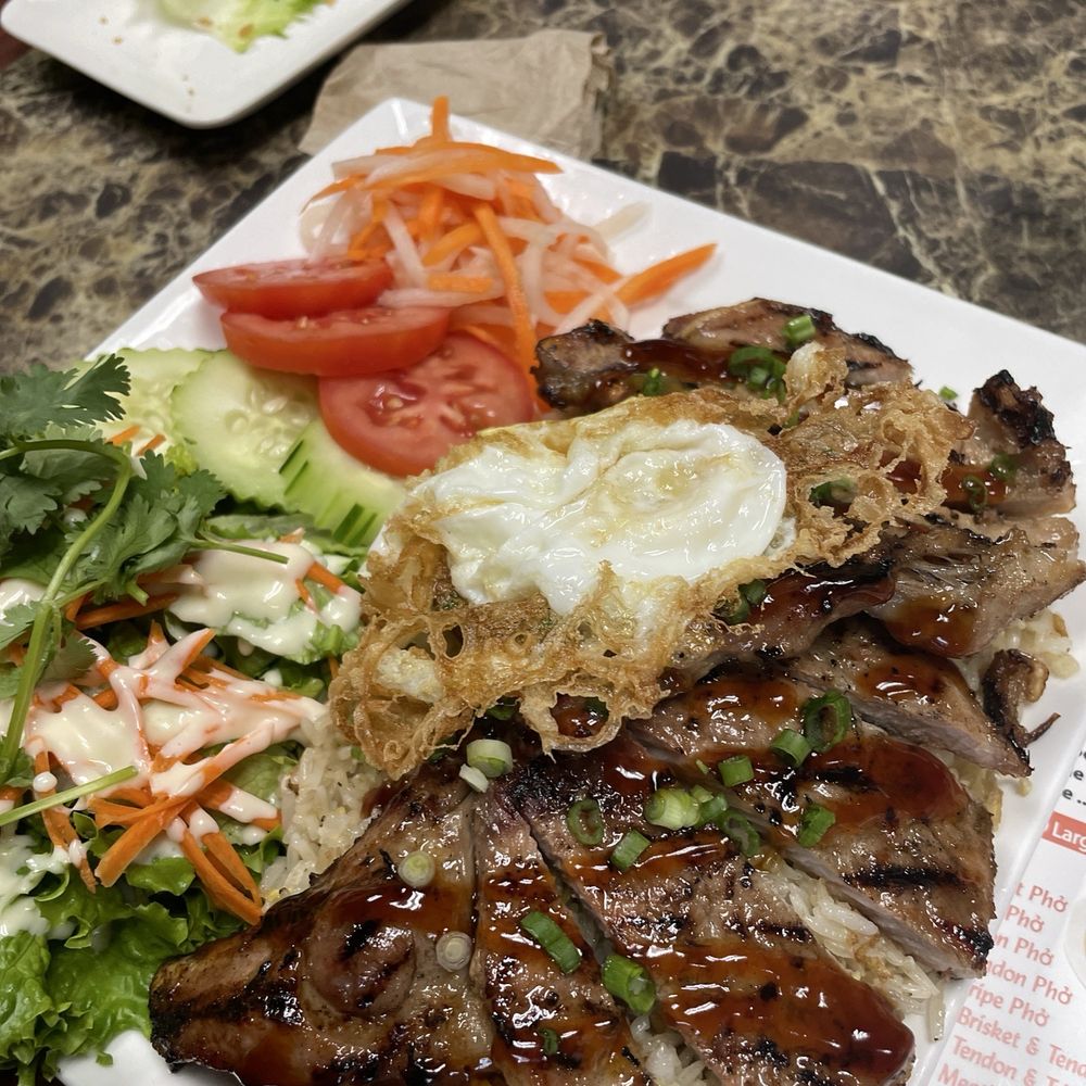 I Want Pho - House fried rice and grilled pork chops with egg. - Vietnamese Near Me - Everett, Washington I Want Pho - House fried rice and grilled pork chops with egg. - Vietnamese Near Me - Everett, Washington