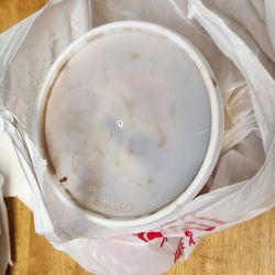 Asia Supermarket - I opened the papaya salad I ordered and there's a half-alive/half-dead cockroach on it.