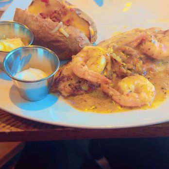 Seaside Grill & Tiki Bar - Jerk grouper with shrimp and I had it with loaded baked potatoes and a side salad - Seafood Near Me - Pompano Beach, Florida Seaside Grill & Tiki Bar - Jerk grouper with shrimp and I had it with loaded baked potatoes and a side salad - Seafood Near Me - Pompano Beach, Florida