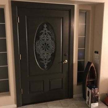 Dramatic Difference - Our front door that looked like it was going to fall apart before Ryan worked his magic. - Refinishing Services Near Me