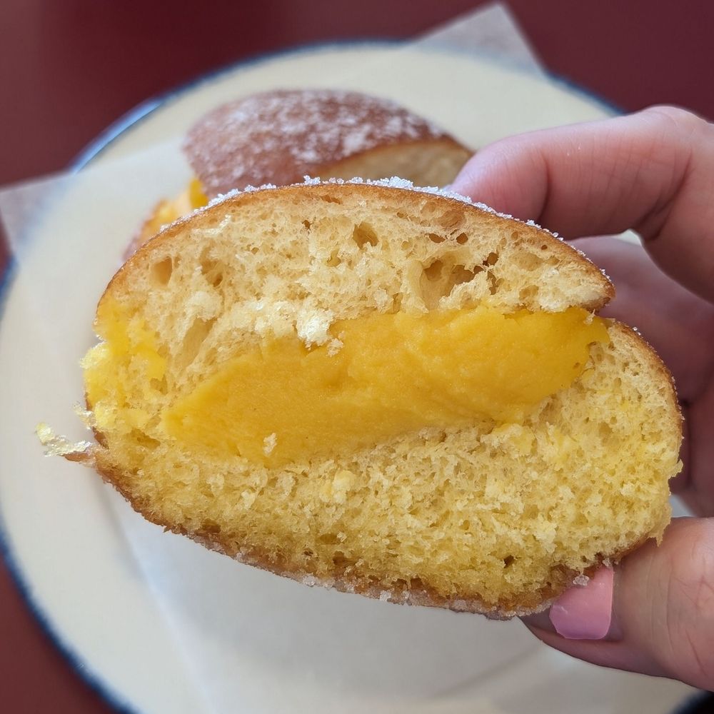 Seara Bakery & Pastry - Cross-section of my Portuguese vanilla custard-filled donut - Coffee & Tea Near Me - Vaughan, Ontario Seara Bakery & Pastry - Cross-section of my Portuguese vanilla custard-filled donut - Coffee & Tea Near Me - Vaughan, Ontario