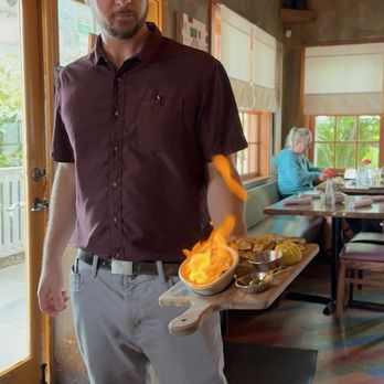 Santiago's Bodega - Saganaki - Tapas Bars Near Me - Key West, Florida Santiago's Bodega - Saganaki - Tapas Bars Near Me - Key West, Florida
