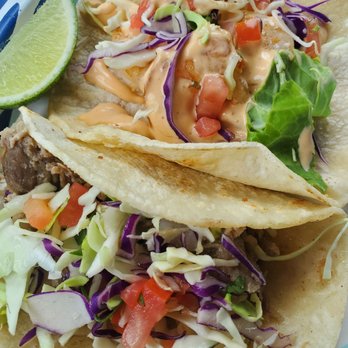 Laz's Tacos - Carnitas taco and shrimp taco. Whatever that magic sauce on the shrimp is, bottle it and take my money. - Food Trucks Near Me - Issaquah, Washington Laz's Tacos - Carnitas taco and shrimp taco. Whatever that magic sauce on the shrimp is, bottle it and take my money. - Food Trucks Near Me - Issaquah, Washington