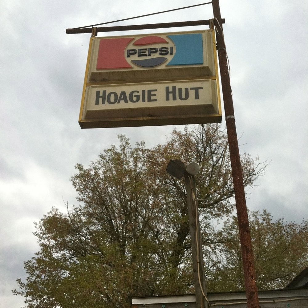 The unmistakable sign welcoming you to Dixon's Hoagie Hut.