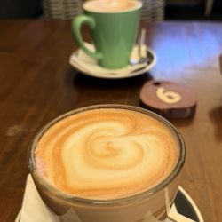 Dynasti Cafe - Cafe latte and vanilla flat white