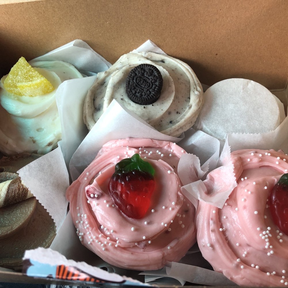 Frosted Cupcakery - Top left: lemon, cookies and creme Bottom left: Nutella, strawberry cheesecake - Bakeries Near Me - Long Beach, California Frosted Cupcakery - Top left: lemon, cookies and creme Bottom left: Nutella, strawberry cheesecake - Bakeries Near Me - Long Beach, California